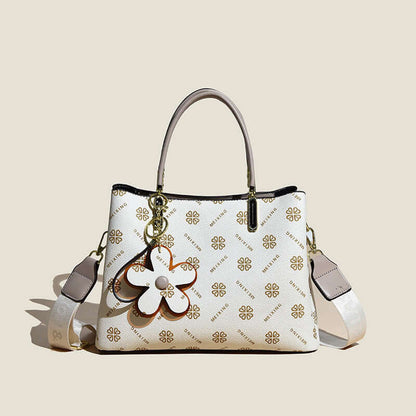 Fashion printed tote bag for women in white with gold pattern and flower keychain by Dropshipman