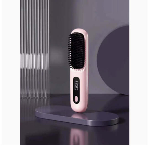 Pink fast heating travel hair straightener brush with digital display standing on a modern surface