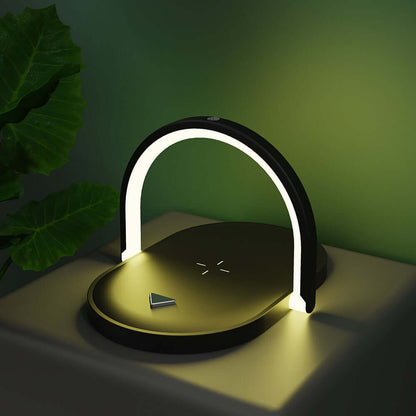 Modern black fast wireless charger with night light featuring an arch LED design on a table