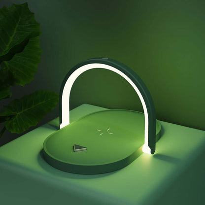 Green fast wireless charger with night light featuring a modern arch design on a green surface