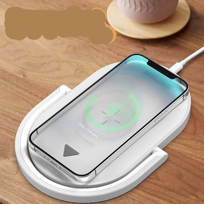 Fast wireless charger with night light charging a smartphone placed on a wooden table