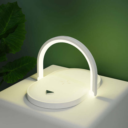 Dropshipman fast wireless charger with night light in modern white design on table near green leaves