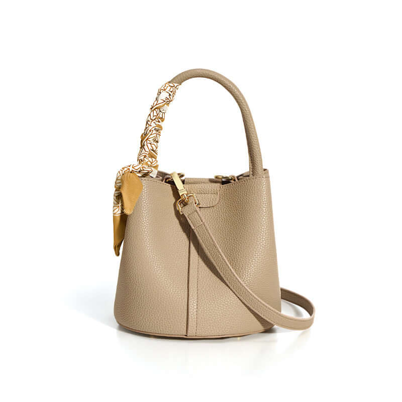 Genuine Leather Advanced Texture Bucket Bag for Women, featuring a stylish beige design with a decorative scarf, perfect for daily use as a genuine leather handbag.