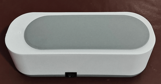 CozyTech Living ultrasonic eyeglasses cleaner in white and gray with compact sleek design
