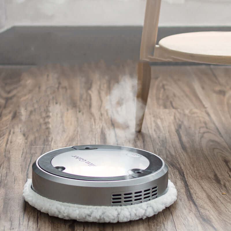 Dropshipman robot vacuum with spray function cleaning hardwood floor near wooden chair leg