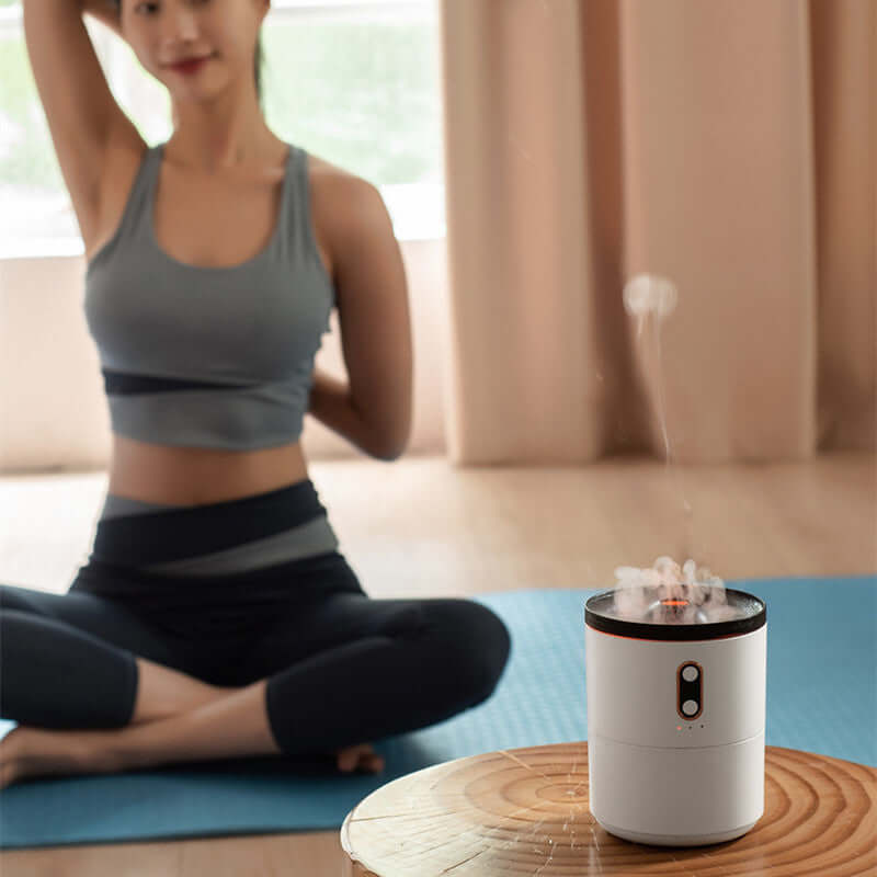 Yoga practitioner in a serene environment with Jellyfish Style Humidifier, highlighting the calming ambiance it provides during wellness activities.