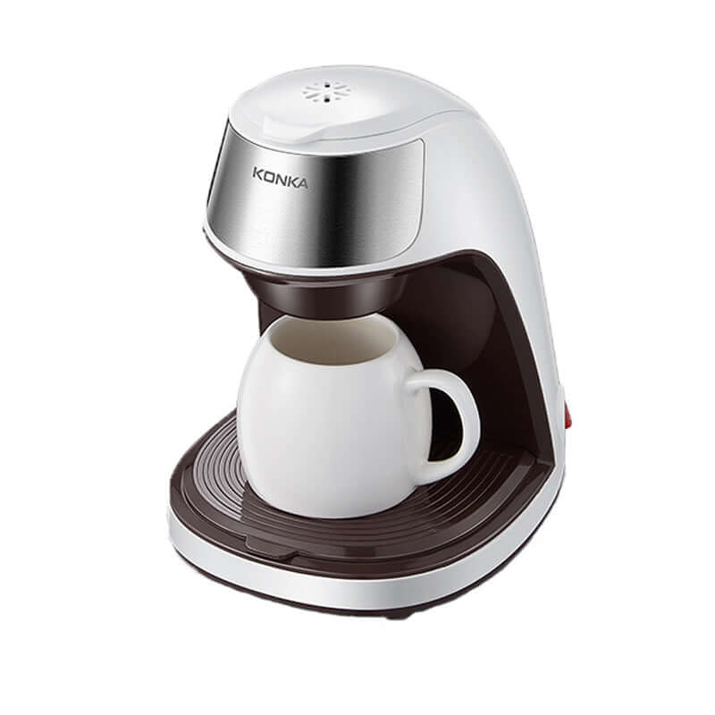 Compact KONKA mini coffee machine for home with white mug and modern design