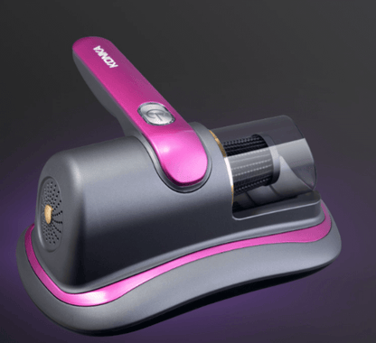 Smart home dust mite remover with ergonomic handle and transparent dust container in gray and pink