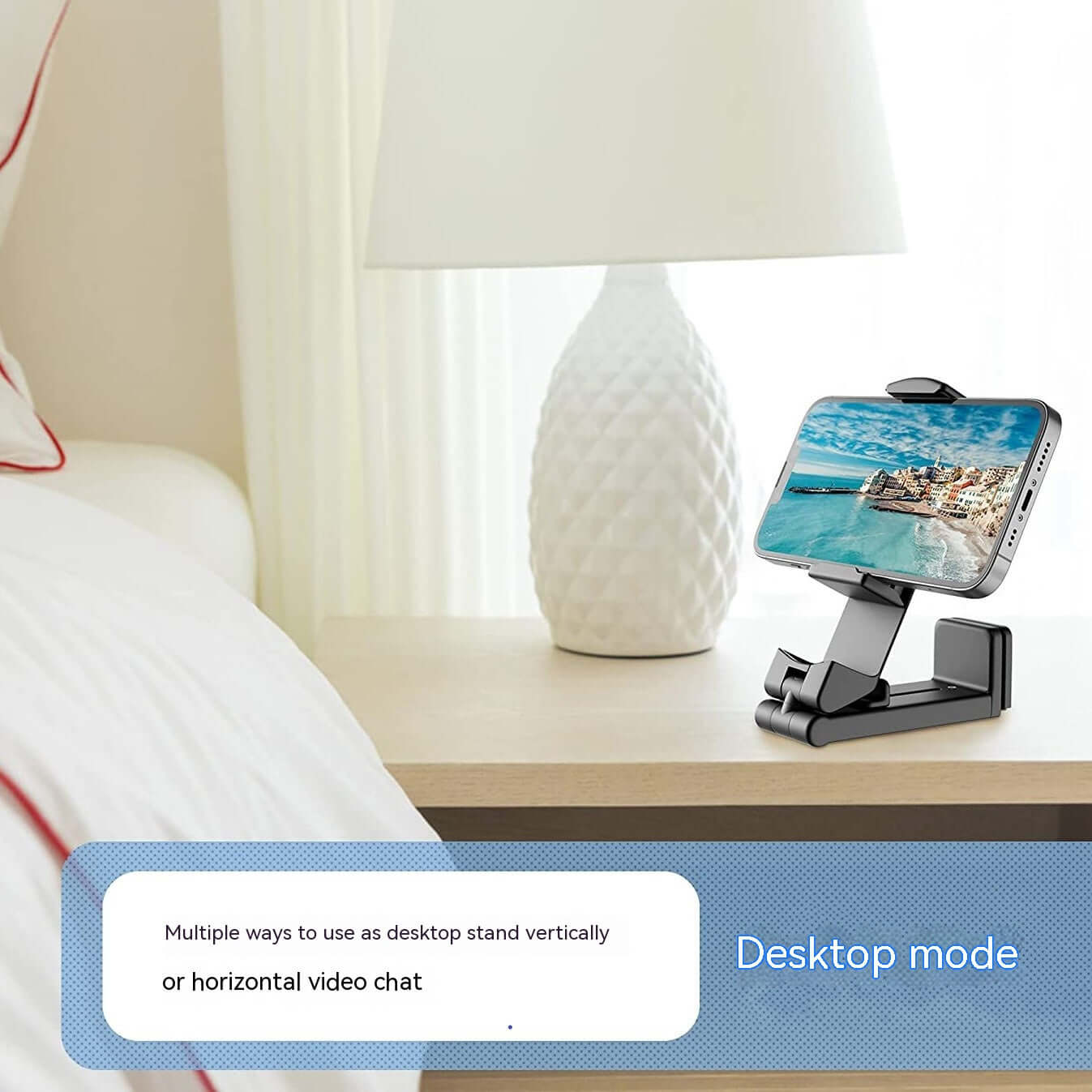 Foldable phone holder for travel in desktop mode holding smartphone horizontally on bedside table