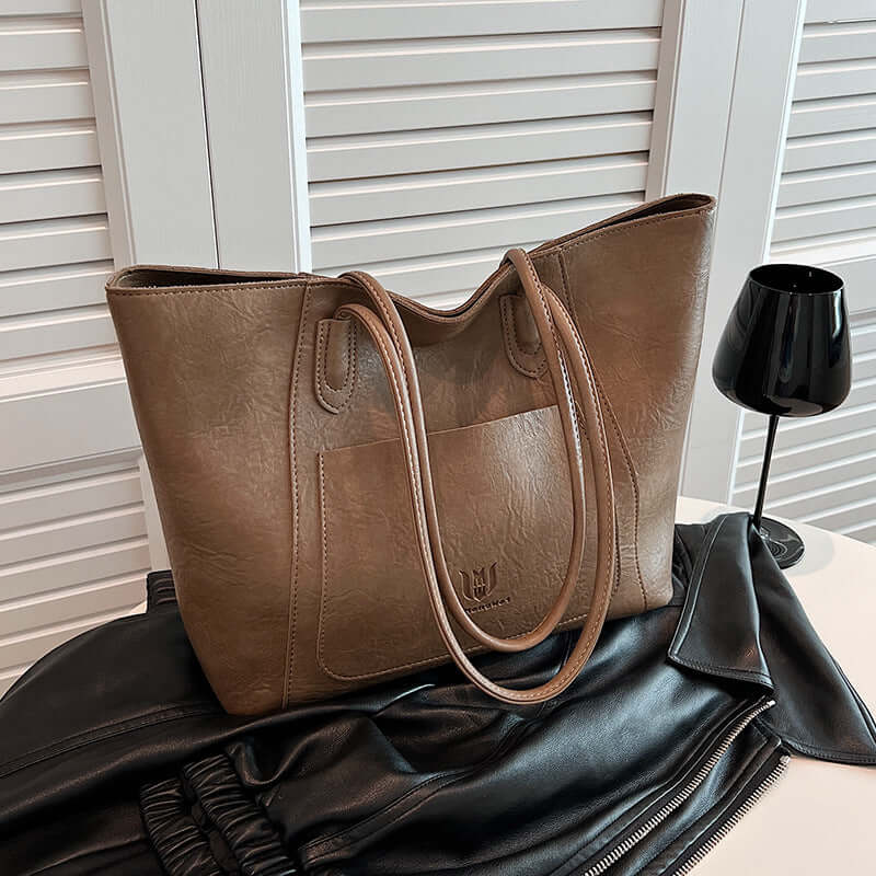 Casual Retro Shoulder Bag Texture Class Commuter Tote displayed on a surface, showcasing the medium soft tote bag in brown.