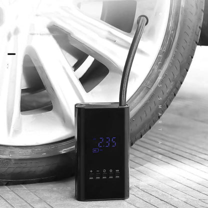 Black portable car tire inflator by Dropshipman inflating a car tire with digital display