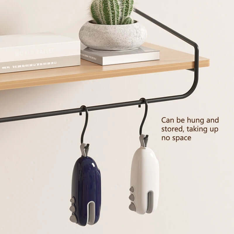 eprolo Portable Sealing Device in black and white colors hanging on a metal rack for space-saving storage