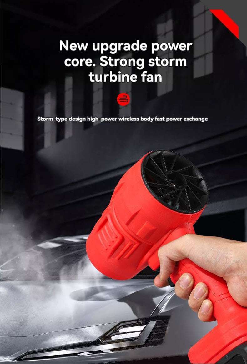 Red rechargeable air blower with storm turbine fan held over car hood by hand