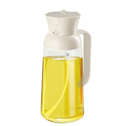 Stylish glass olive oil dispenser with white lid and handle filled with yellow olive oil