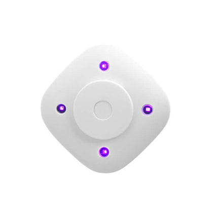White UV toilet sterilizer for bathroom emitting purple light with compact modern design