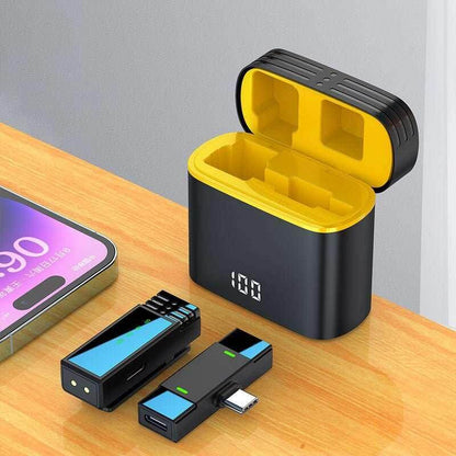 Eprolo Clear Reception Wireless Microphone with charging case on a desk next to a smartphone, designed for seamless live streaming microphone usage.